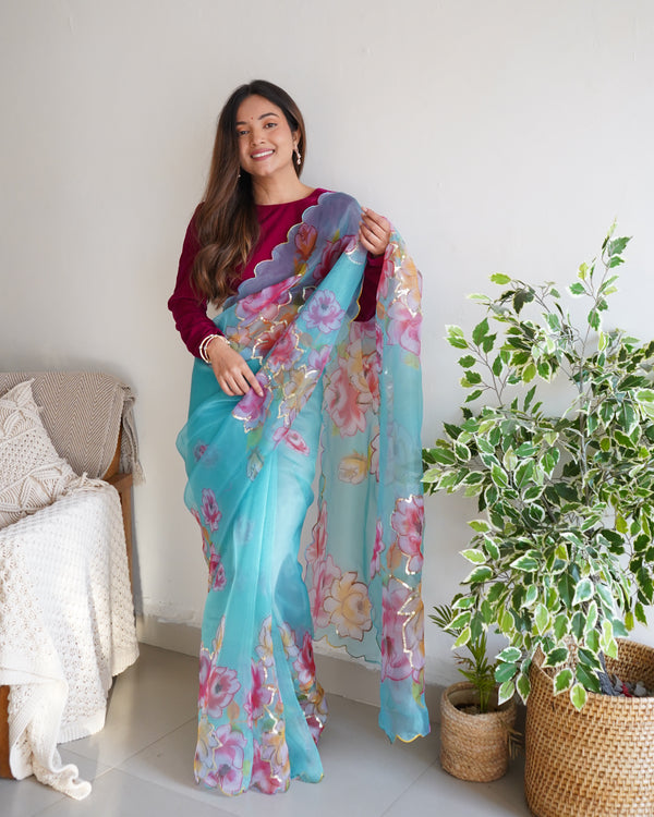 Aqua Blue Organza Saree with Vibrant Floral Prints