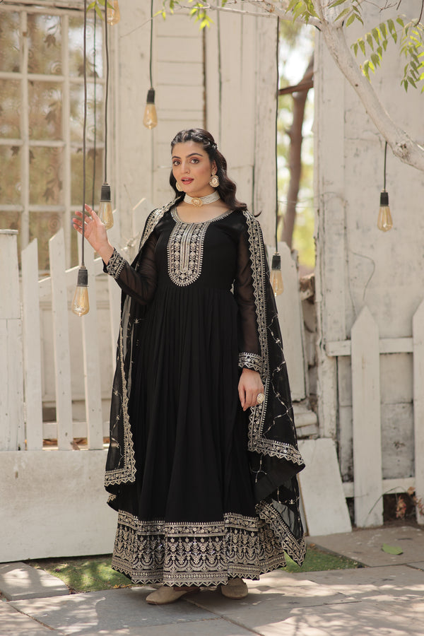 Black Gown Featuring Intricate Gold Embroidery and Embellished Dupatta