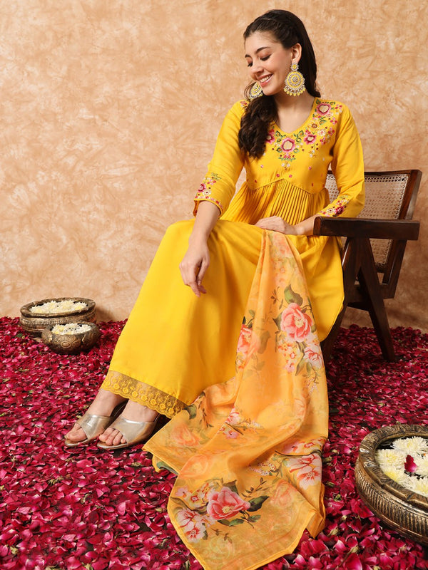 Golden Yellow Kurti Set with Flowing Floral Dupatta and Intricate Details